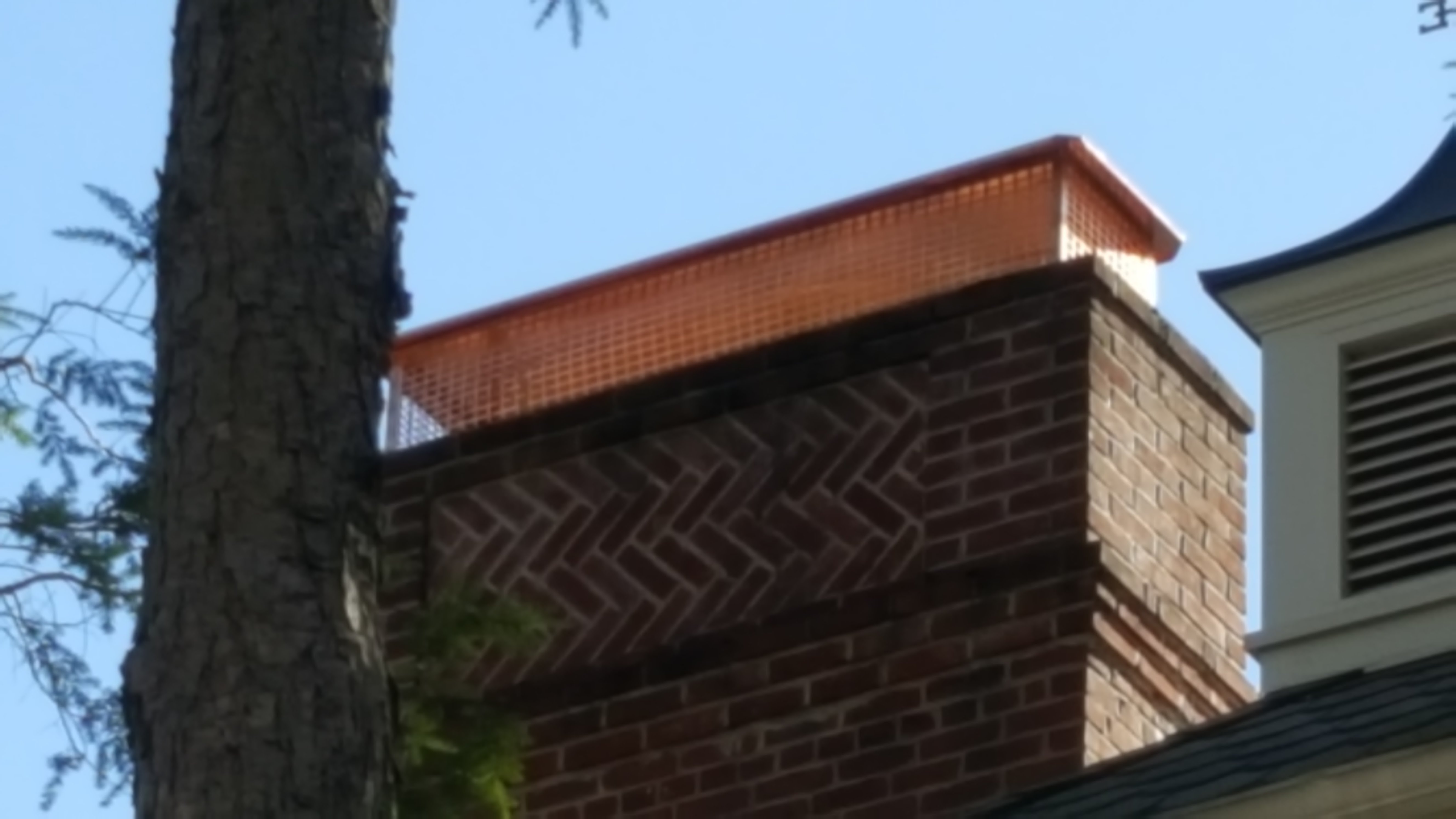 New stainless steel chimney cap installed in Massapequa Park, NY
